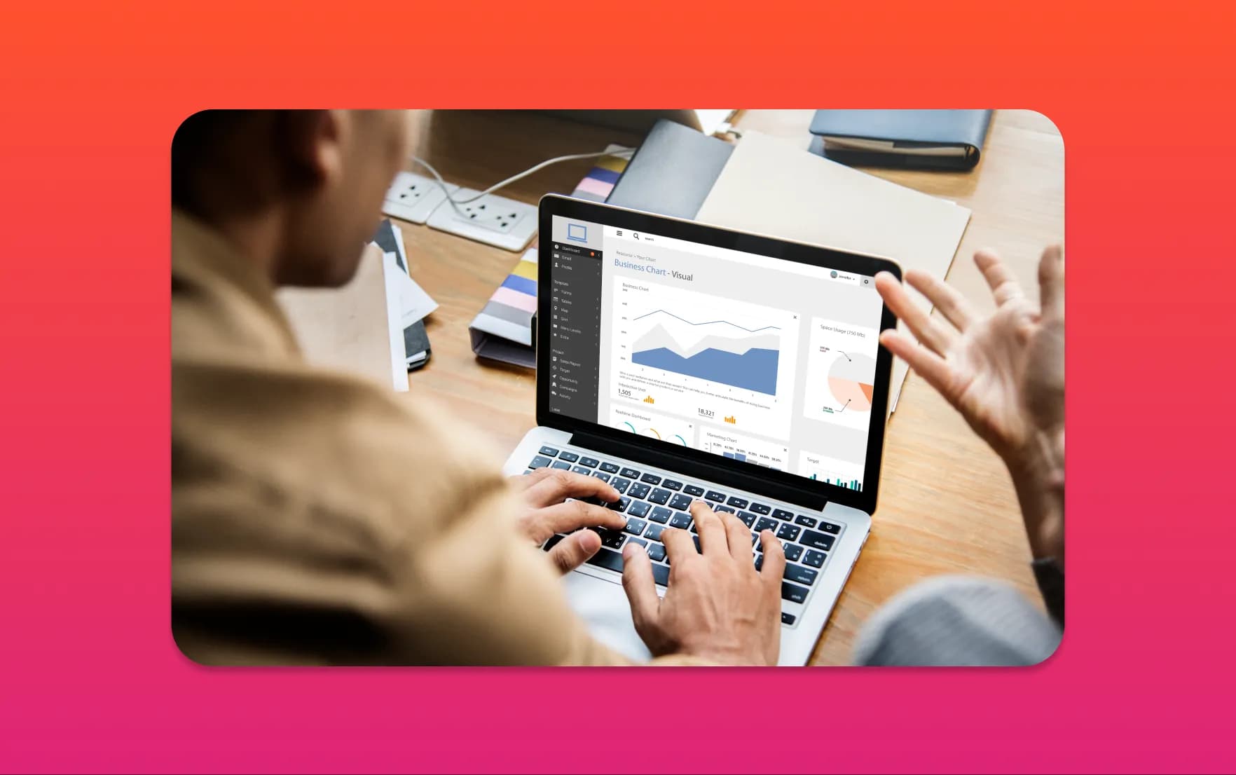 Two people reviewing a chart-based business dashboard on a laptop