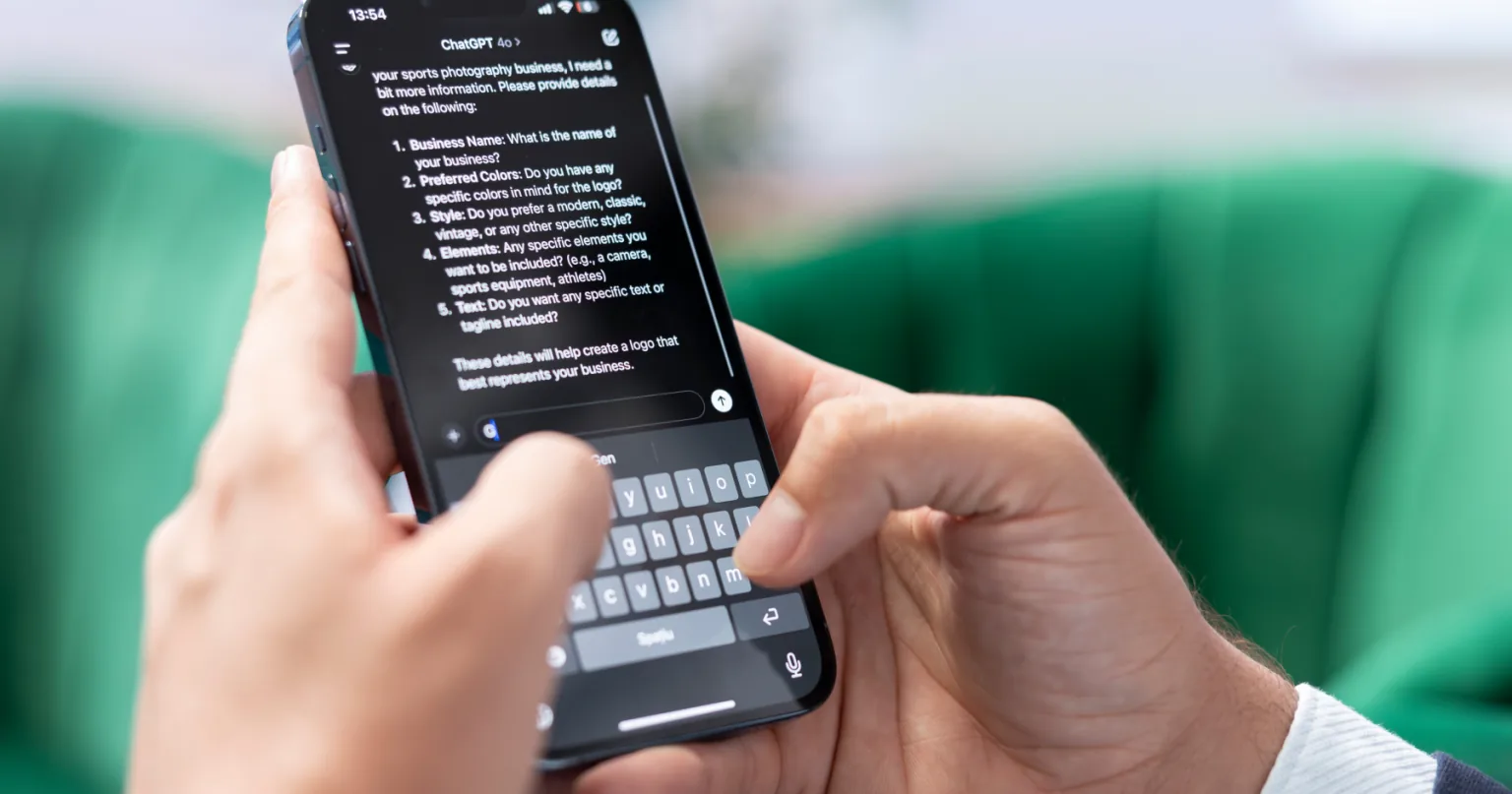 Frustrated customer looking at a phone showing an AI chatbot conversation stuck in a loop